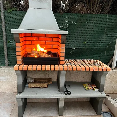 Apartamento bajo con terraza y piscina-3