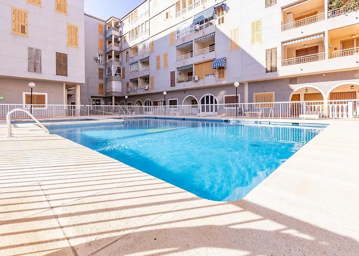 Apartamento Torrevieja Playa Naufragos y piscina comunitaria