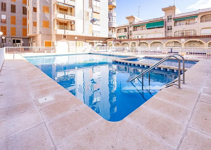 Apartamento Torrevieja Playa Naufragos y piscina comunitaria