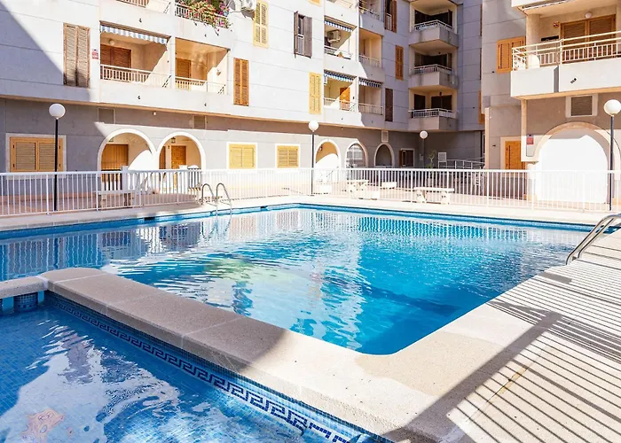 Apartamento Torrevieja Playa Naufragos y piscina comunitaria